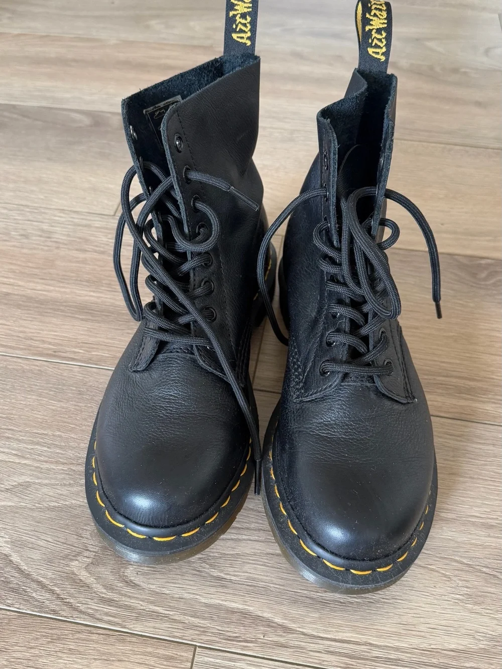 Dr. Martens Black Leather 8-Eye Lace-Up Boots with Yellow Stitching